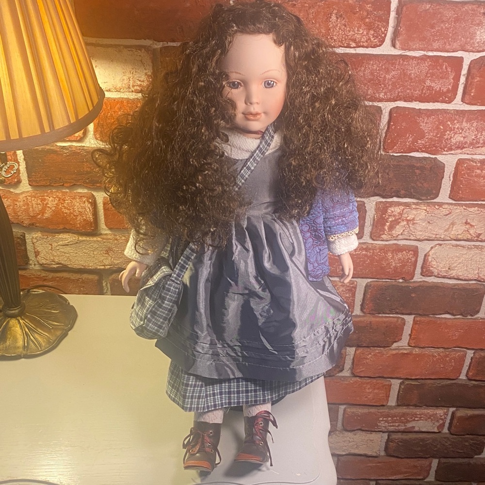 Porcelain Collectible Girl Doll in Purple Dress